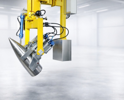 Lastaufnahmemittel mit Hebezange und Ziehdorn zum sicheren Greifen und Handling konischer Bauteile in der industriellen Anwendung